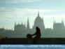 Photo: Backpacker silhouetted against The Parliament, Budapest Hungary ©2006 Koncz Dezső