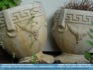 Photo: 2 derelict urns behind Aden's Grille (former Greek Restaurant) ©2006 World-Link 
